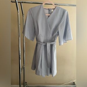 A romper dress that is from South Korea. The romper has been worn 2 or 3 times.